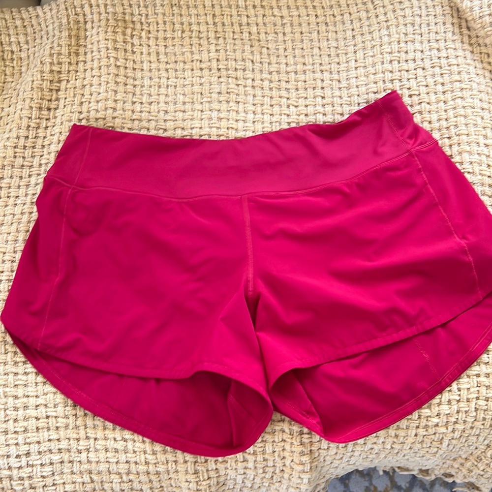 Lululemon red shorts with back zipper pocket size 12 tall